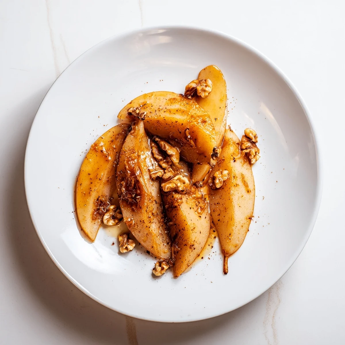 Maple-Warm Cozy Plate: Caramelized pears and walnuts, glistening with maple syrup, baked to golden perfection.