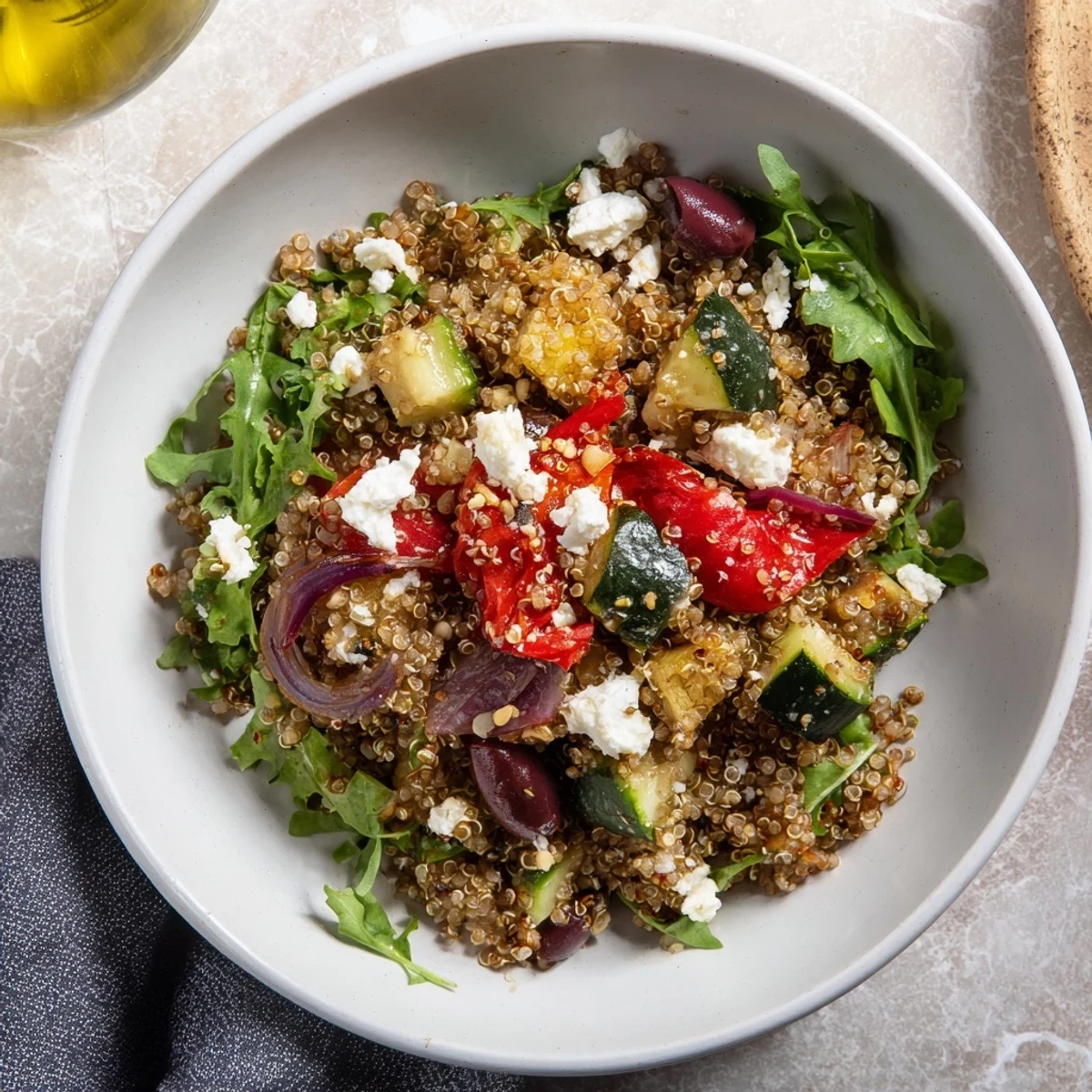 Enjoy this flavorful Mediterranean Grain Bowl; a healthy medley of grains, veggies, and feta cheese, ready to serve.