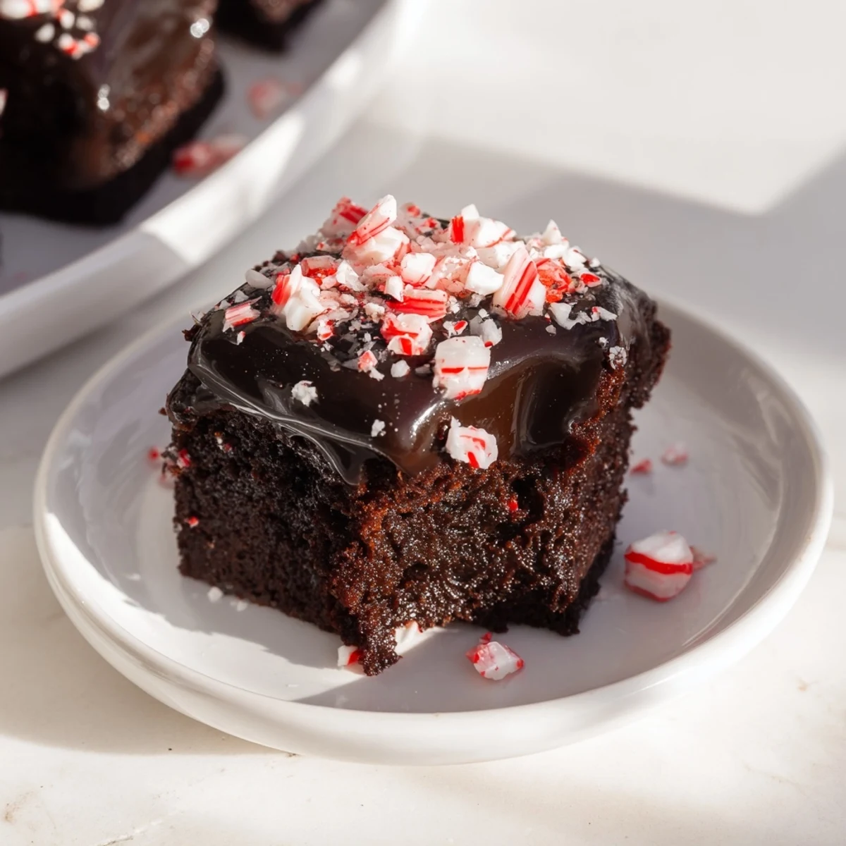 Warm, freshly baked Peppermint Mocha Brownie Bites, a chocolatey delight with an espresso and peppermint twist.